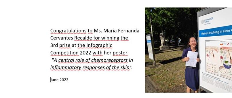 Maria Cervantes stands beside her Poster