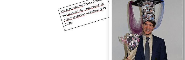 Tobias Pointner Portrait mit PhD Hut